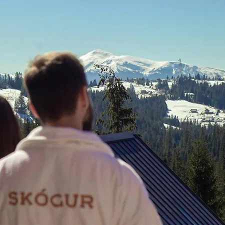 Skogur - & *